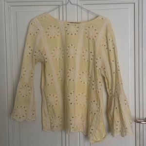 Yellow Cotton Embroidered T Shirt with bell sleeves and cut out flowers
